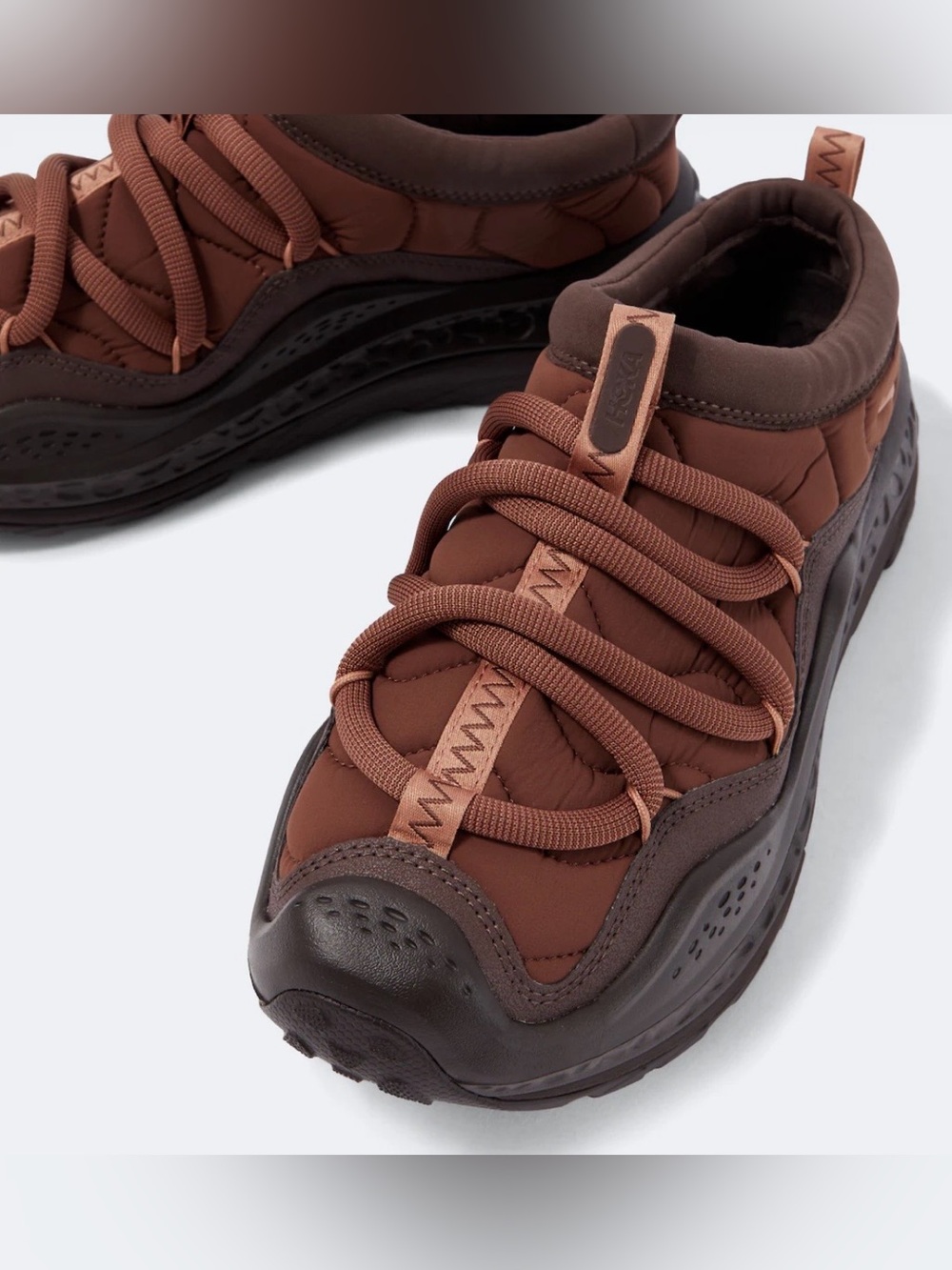Hoka Ora Primo recovery shoe in the "Mineral Brown / Cast Iron" colorway